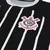 Camisa preta do II Corinthians 23/24, destacando o escudo do time com detalhes em vermelho e branco