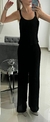 Conjunto negro plisado en internet