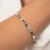 BRACELETE NÚMEROS ROMANOS C/ ZIRCÔNIAS AÇO INOX