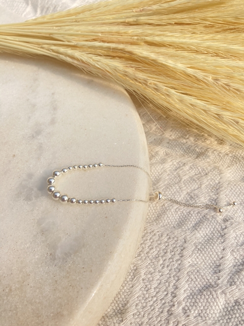 Pulseira gravatinha de bolinhas