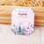 Brinde Tag c/ corte especial com brinco pérola - Martha Janaina Designer