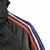 Jaqueta Corta-Vento Bayern de Munique 23/24 - Masculina Adidas - Preta com detalhes em vermelho e branco e azul - CAMISAS DE FUTEBOL - NO TRAJE F.C