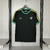 Camisa Jamaica Black 2024 versão torcedor masculina, com detalhes em verde e amarelo e logo da marca.