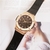 relogio hublot gineve big bang dourado com fundo marrom