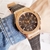 relogio hublot gineve big bang dourado com fundo marrom