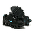 Tênis Nike Shox TL nas cores preto com detalhes azul bebê
