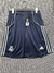 short torcedor do real madrid i temporada 25/26 cor predominante em azul marinho com detalhes em branco e verde fluorescente
