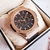 relogio hublot gineve big bang dourado com fundo marrom