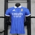 Camisa masculina do Real Madrid, edição especial 25/26, com detalhes em azul e logo do time.