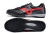 Black and red soccer cleats with a textured surface and a durable sole.
