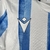 Kit Infantil Real Sociedad I Macron 23/24 - Branco com detalhes em azul - Rei do Mantoh | Camisas de Futebol | NBA 