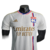 Camisa branca do Lyon I Home 23/24 para jogador masculino, com detalhes em vermelho e azul e logotipo da Adidas.