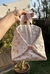 Bolsa com estampas rosas na internet
