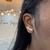 Brinco ear cuff asas na internet