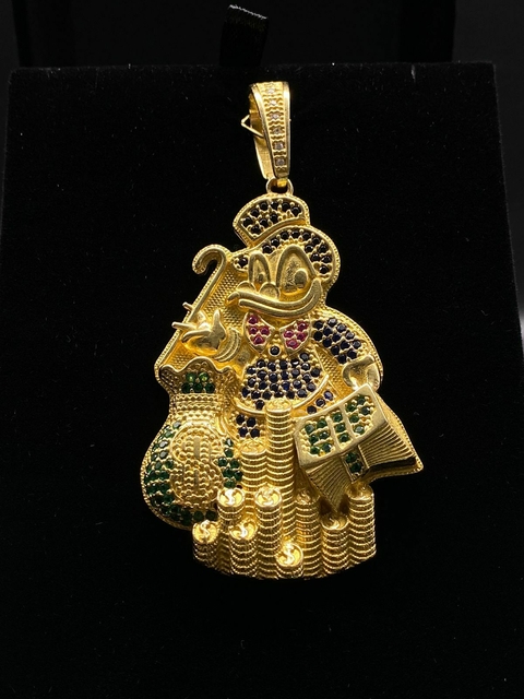 TIO PATINHAS COM MALOTE E MOEDAS CRAVEJADA - 8,1 CM