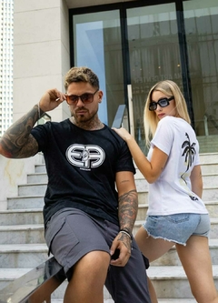 REMERA AMBITIONS DAMA PALMERAS