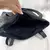 BOLSO JHON C/TACHAS - Clothes.amiraa