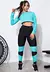Conjunto fitness com cropped de telinha manga longa e calça legging preta com detalhes em azul turquesa.