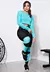 Conjunto fitness com calça legging e cropped de telinha, detalhes em azul turquesa, modelo feminino.