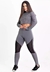 Conjunto fitness composto por calça legging cinza com detalhes em tela e cropped de manga longa cinza, ideal para atividades físicas.