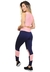 Conjunto de calça legging e cropped rosa e azul, modelo fitness, com a modelo de costas exibindo o design moderno.