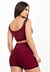 Conjunto fitness composto por short cintura alta e cropped marsala com alças duplas, visto de costas.