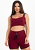 Conjunto fitness composto por cropped marsala de alça dupla e short cintura alta com cardaço fake.