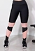 Calça legging fitness preta com detalhes em rosê, ideal para atividades físicas.