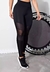Calça Madri Legging preta com detalhes em tela, ideal para moda fitness
