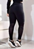 Calça legging fitness preta com detalhe em tela, vista traseira, ideal para atividades físicas.