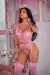 Conjunto Princesa em Tule Bordado na cor rosa bebê, exibindo detalhes do sutiã e da calcinha com transparência e meias altas