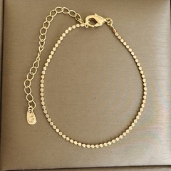 Pulseira Bolinhas Achatadas Delicada Banhada a Ouro 18k na internet