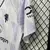 Imagem do Camisa Manchester United Away 25/26 - Torcedor Infantil Branca e Roxa