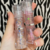 A152 Gloss con glitter transparente de miss betty - comprar online