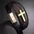 pulsera de cuero con aplicacion de metal religioso