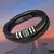 pulsera de cuero con bellas inscripciones celtas. en internet