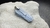 Imagen de DIJE CIANITA AZUL CON DETALLE DE PIEDRA SELENITA LÍNEA ALPACA