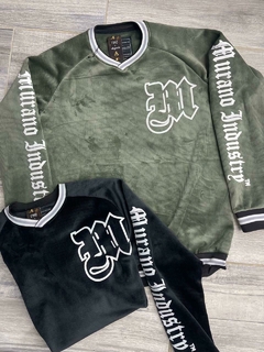 buzo mangas con detalles