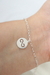 PULSEIRA COM PINGENTE INFINITO
