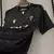 Camisa Cadiz III 23/24 - Torcedor Macron Masculina - Preta com detalhes em dourado