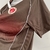 Camisa FC St Pauli I 23/24 - Torcedor Diiy Masculina - Marrom com detalhes em vermelhos e branco - loja online