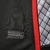 Camisa Frankfurt I 21/22 - Torcedor Nike Masculina - Preta com detalhes em vermelho e branco - loja online