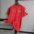 Camisa Sevilla II 23/24 - Torcedor Castore Masculina - Vermelha com ondulações cinza e dourado na internet