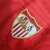 Imagem do Camisa Sevilla II 23/24 - Torcedor Castore Masculina - Vermelha com ondulações cinza e dourado