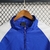 Jaqueta Corta-Vento 23/24 Masculina Adidas Flamengo- Azul com mangas brancas e com detalhes em verde e vermelho na internet