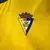 Imagem do Kit Infantil Cadiz I Macron 23/24 - Amarelo com detalhes em azul