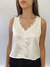 Blusa de seda corta