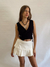 Short-pollera con vuelos