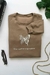 Blusa de Moletom Peluciado Orar,confiar e agradecer borboleta -Brown na internet