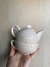 tetera con taza